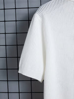 Polo tricoté à design ajouré - Vignette | URBAÏA 